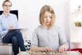 Little girl with building blocks with letters