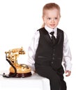 Little girl in business suit call telephone. Royalty Free Stock Photo