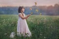 Little girl with butterflies