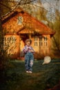 Little girl with butterfly net outdoor at sunset Royalty Free Stock Photo