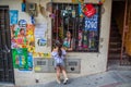 Little girl buying candy at street side store