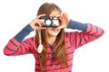 Little girl with a camera Royalty Free Stock Photo