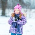 Little girl with a camera