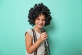 Little girl in carnival costume dancing and singing Royalty Free Stock Photo