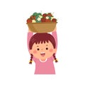 Little girl carrying basket full of ripe strawberries Royalty Free Stock Photo