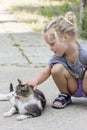 Little girl with cat