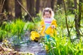 Little girl catching a frog Royalty Free Stock Photo