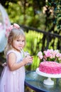 Little girl celebrate Happy Birthday Party with rose outdoor