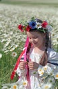 Little girl on chamomile field Royalty Free Stock Photo