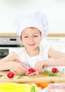 Little girl in chef hat. Royalty Free Stock Photo