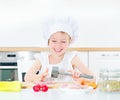 Little girl in chef hat. Royalty Free Stock Photo