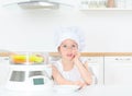 Little girl in chef hat. Royalty Free Stock Photo