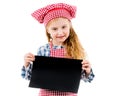 Little girl in chef uniform with blank paper Royalty Free Stock Photo