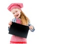 Little girl in chef uniform with blank paper Royalty Free Stock Photo