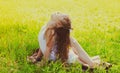 Little girl child doing yoga exercise stretching on grass in sunny summer day Royalty Free Stock Photo