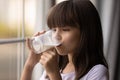 Little girl child feel thirsty drink tasty milk Royalty Free Stock Photo