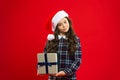 Little girl child in santa red hat. Christmas shopping. Happy winter holidays. Small girl. Present for Xmas. Childhood Royalty Free Stock Photo