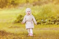 Little girl child walking in autumn