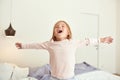 Little girl child yawn awaken from night sleep Royalty Free Stock Photo