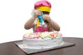 Little girl children decorate cream cake