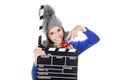 Little girl with a clapperboard