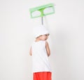 Little girl cleaning with a mop. Royalty Free Stock Photo