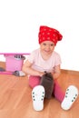 Little girl cleaning up isolated with clipping path Royalty Free Stock Photo