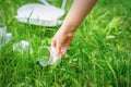 Little girl cleans plastic utensils