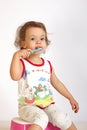 A little girl cleans teeth. Royalty Free Stock Photo