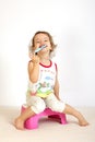 A little girl cleans teeth. Royalty Free Stock Photo