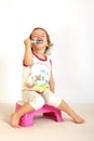 A little girl cleans teeth. Royalty Free Stock Photo