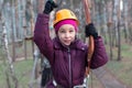Little girl climber is ready to the passage Royalty Free Stock Photo
