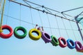 Little girl climbing on an outdoor ropes course. Royalty Free Stock Photo