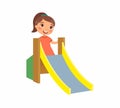 Little girl climbs a children`s slide. Joyful child, summer vacation. ÃÂ¡oncept of vacation and entertainment on the playground. Royalty Free Stock Photo