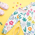 Little girl clothing and accessories - pretty dress, sandals, sunglasses. Baby summer fashion concept. Royalty Free Stock Photo