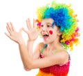 Little girl in clown wig fooling around Royalty Free Stock Photo