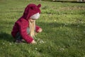 Little girl collecting flowers on first spring day Royalty Free Stock Photo