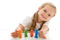 Little girl with colored clay figurines Royalty Free Stock Photo