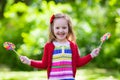 Little girl with colorful candy lollipop Royalty Free Stock Photo