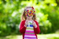 Little girl with colorful candy lollipop Royalty Free Stock Photo