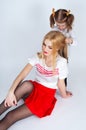 Little girl combing her hair beautiful mother Royalty Free Stock Photo