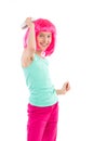 Little girl combing pink hair Royalty Free Stock Photo