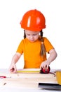 Little girl with a construction helmet
