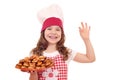 Little girl cook with bruschette and ok hand sign