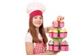 Little girl cook with colorful sweet muffins