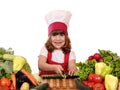 Little girl cook cutting cucumber Royalty Free Stock Photo