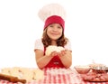 Little girl cook with dough