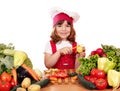 Little girl cook peeling potatoes Royalty Free Stock Photo