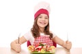 Little girl cook with seafood ready for lunch Royalty Free Stock Photo