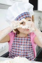 Little girl cooking in kitchen Royalty Free Stock Photo